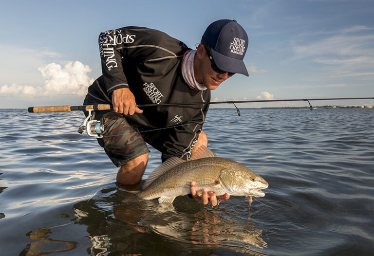 Man Holding Caught Fish