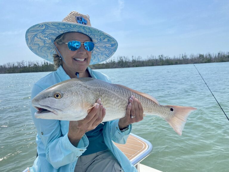 Woman Holding Big Fish