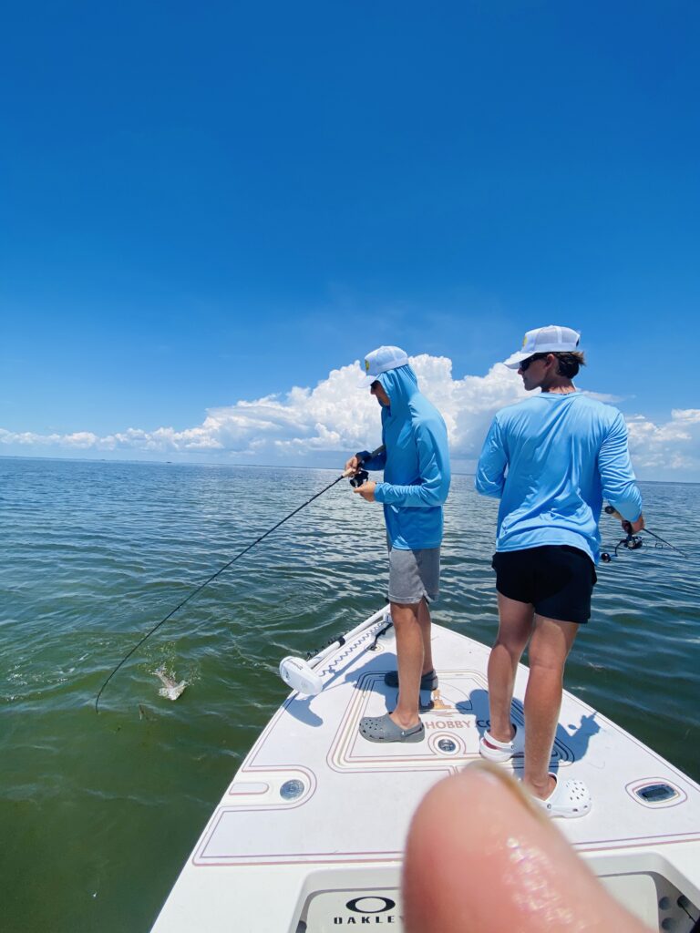 Two Men Wearing Blue Long Sleeves