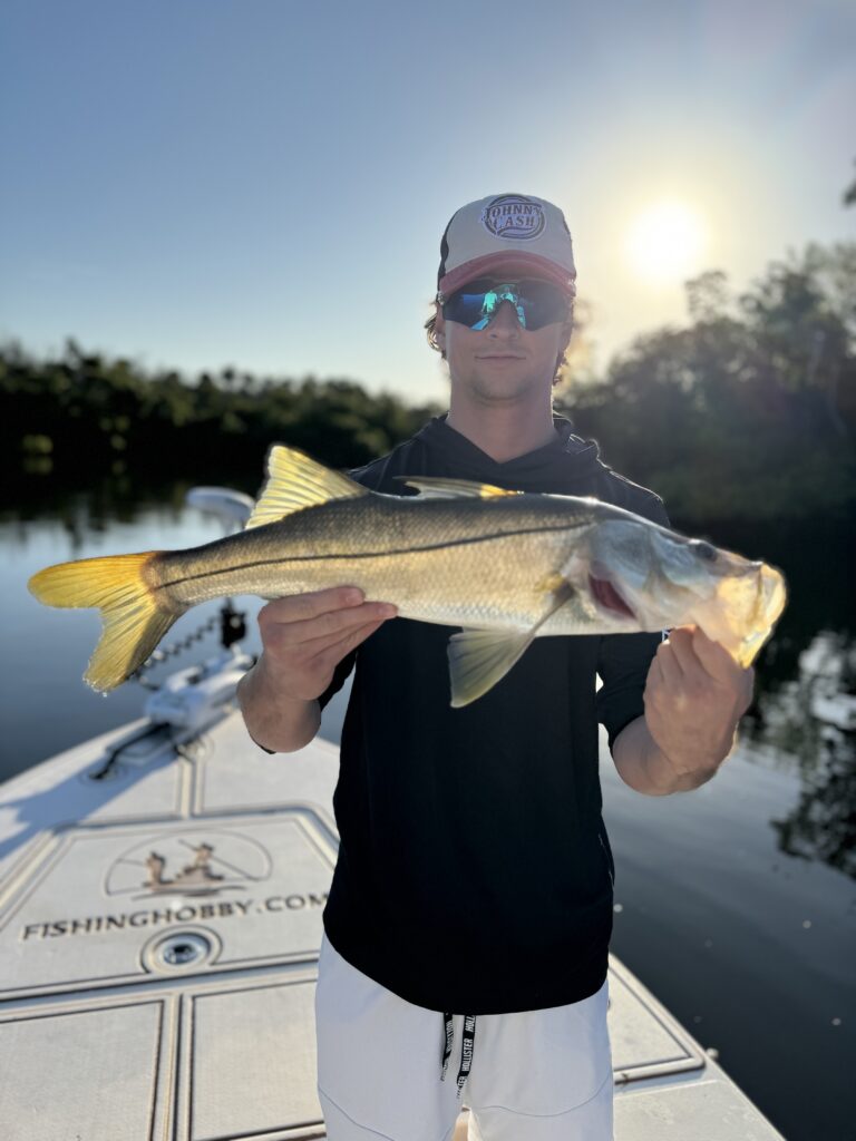 Hobbyist Holding Caught Fish
