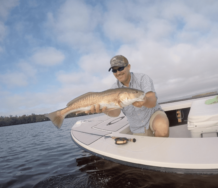Happy Man Holding Fish